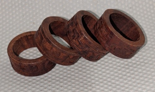 Turned carved wooden napkin - &,
