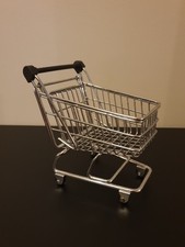 small collectable shopping trolley used for holding trinkets/rubbers etc