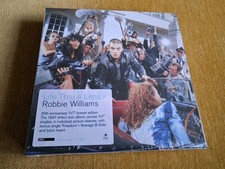 Robbie Williams - Life Thru A