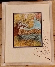 A framed Batik artwork, by