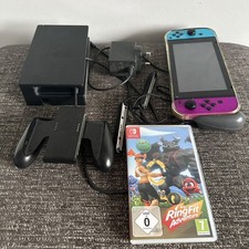 Nintendo Switch Game Console Neon Purple/Blue and Ring Fit Adventure