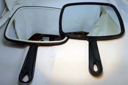 Hand held mirror - held,