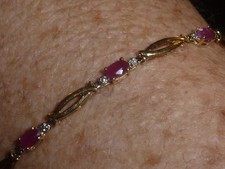 10K SOLID GOLD OVAL-CUT RUBY