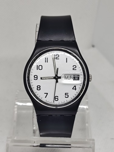 Unisex swatch watch white face - swatch,