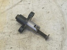 TIMING CHAIN TENSIONER FOR