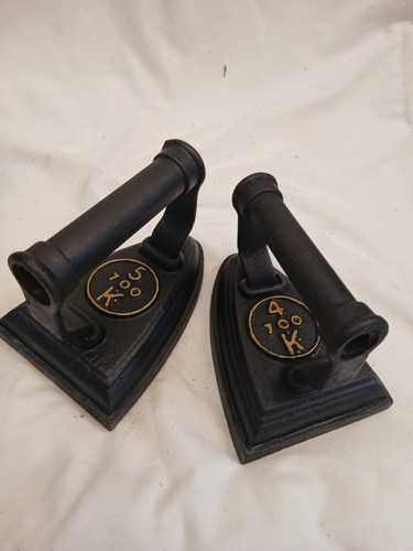 Antique pair cast irons - pair, 700k