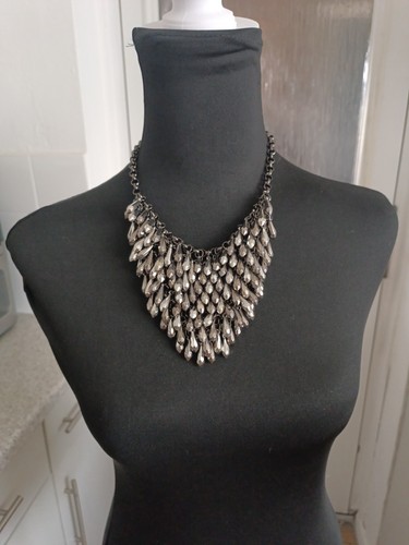 Gun metal statement bib - gun,