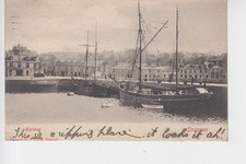 View of masted boats in