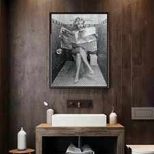 Sexy Girl Reading On Toilet