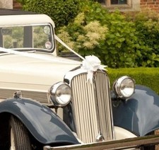 White wedding car - white, bows