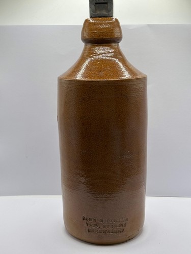 Old brown stoneware vets - old,