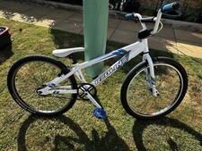 Redline Cruiser MX24 BMX Bike - 6061-T6 Alloy Frame In White with Blue Contrast.