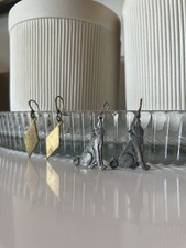 Silver Wolf & Brass Triangle