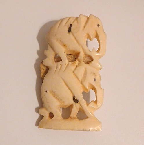 Carved animal design brooch - carved,