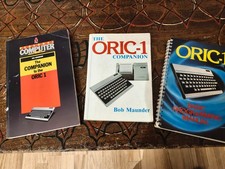 Three Oric-1 computer manuals in reasonable condition for age