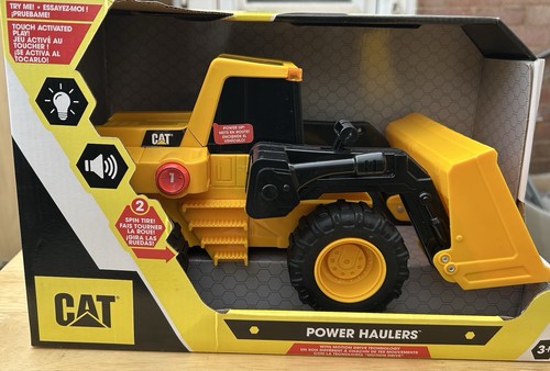 Cat construction power haulers - cat,