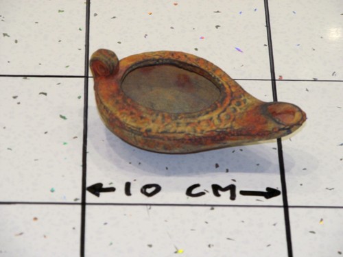 Vintage terracotta oil lamp