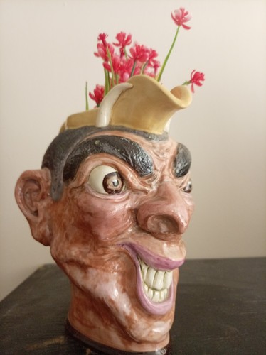 Grotesque face jug - face,