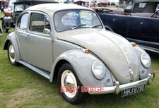 PHOTO  CAR HHJ879D VW BEETLE  CLASSIC CARS AND BUSSES AT THE RALLY. THE INCREDIB