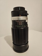Soligor 200mm f3.5 telephoto lens with Built In Hood.