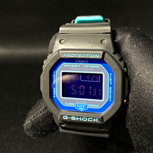 Teal and black shock dw5600 - g,
