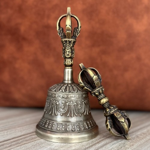 Bell with bajra and prayer - bell,