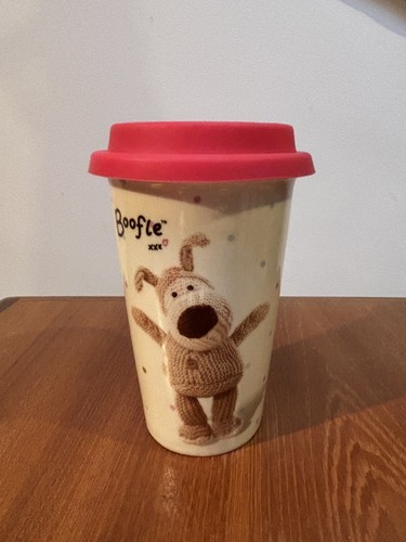 Boofle the mug with - with, lid