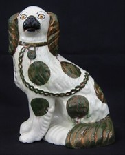 Staffordshire Wally dog - Copper lustre highlights on Green Glaze & Black Nose