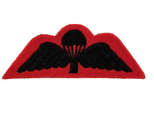British Army Kings Royal Rifle Corps Paratrooper’s cloth jump wings on red wool