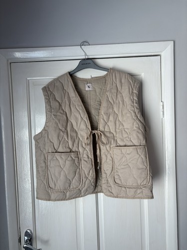 Beige gilet size l - tu,