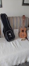 Ukulele, Great Condition, Good Sound. Inc Strap, Soft case, and Chord Book .