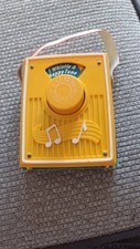 Vintage Fisher Price Music Box Pocket Radio " I Whistle A Happy Tune"