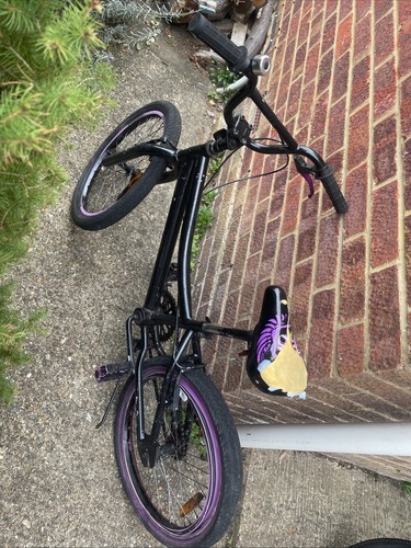 Bmx with broken back tire - a,