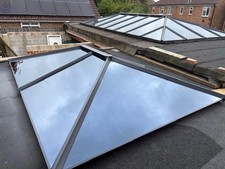 Bi fold doors and roof