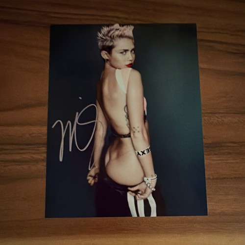 Miley cyrus autographed 8x10 - miley,