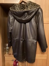 Soft brown leather Jane Norris ladies parka coat with leopard fur lining