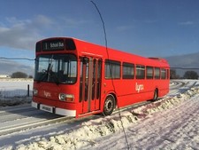 BUS PHOTO LYNX PHOTOGRAPH LEYLAND NATIONAL EX HANTS & DORSET UFX852S IN SNOW.