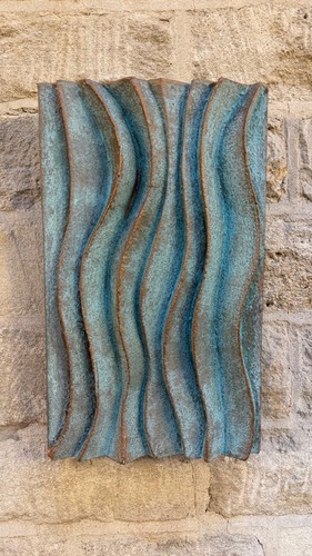 Wall sculpture with - a, wave