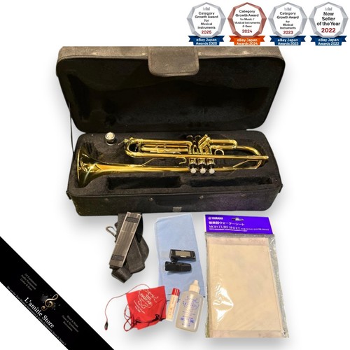 Gold trumpet with - with, case