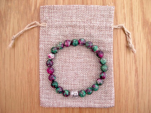 Silver buddha head - head,, ruby
