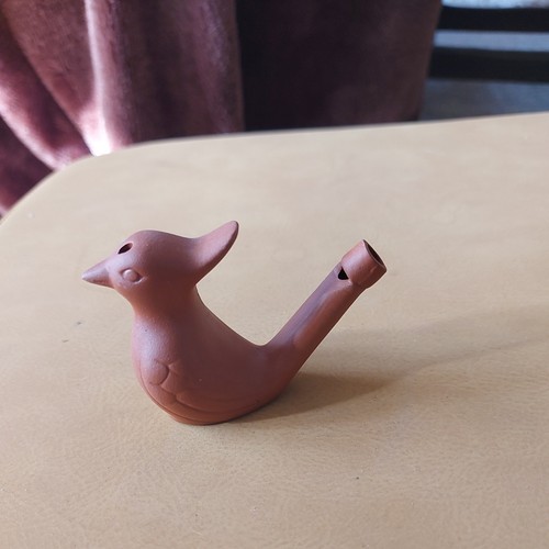 Whistling sparrow terracotta - whistling,