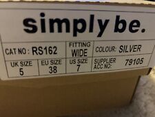 silver shoes and matching bag