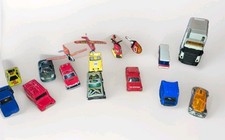 16 toy helicopters, planes, trucks, jeeps, cars