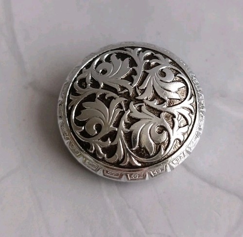 Silver tone black round - &,