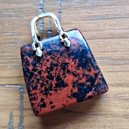 Mahogany obsidian carved - mahogany,