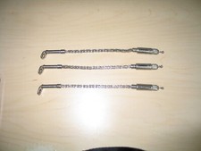 Set of three stainless steel carp hangers.