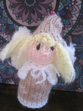 ONE HAND KNITTED XMAS FAIRY. 4 INCHES TALL.