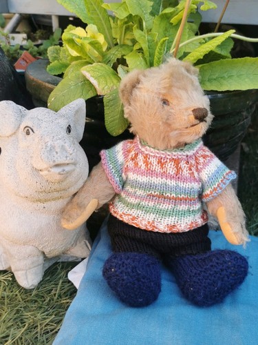 Hand knitted teddy bear - hand,