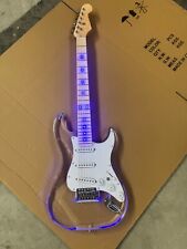 Acrylic white electric guitar that glows