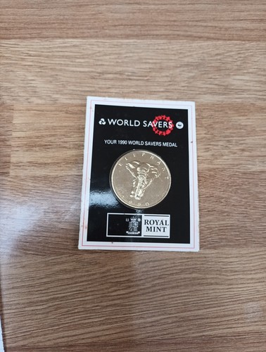 World savers coin - , 1990